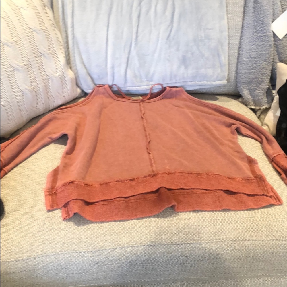 Anama shirt in a pink rust color.